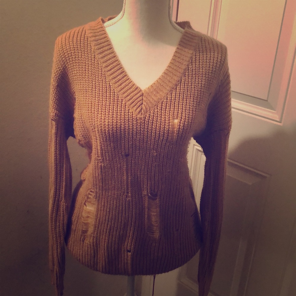 Tan sweater with trendy rips